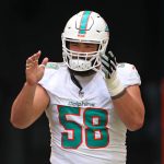 Former Miami Dolphins offensive lineman Connor Williams, who has agreed to a contract with the Seattle Seahawks, runs onto the field for his game against the New York Giants at Hard Rock Stadium on Sunday, Oct. 8, 2023 in Miami Gardens. (John McCall / South Florida Sun Sentinel)