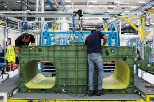 Employees work on the assembly line at a Boeing facility. (Alex Flynn/Bloomberg)