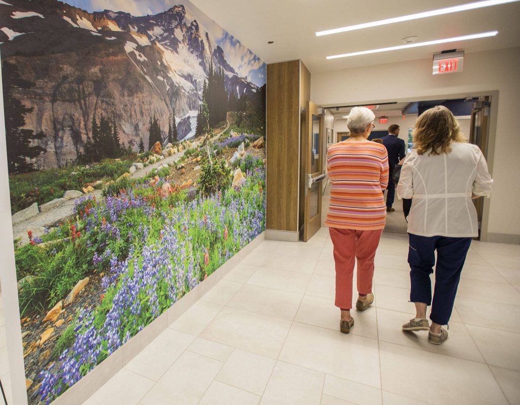 People walk through the lobby at the new Providence Swedish Rehabilitation Hospital on Wednesday near Lynnwood. (Olivia Vanni / The Herald)