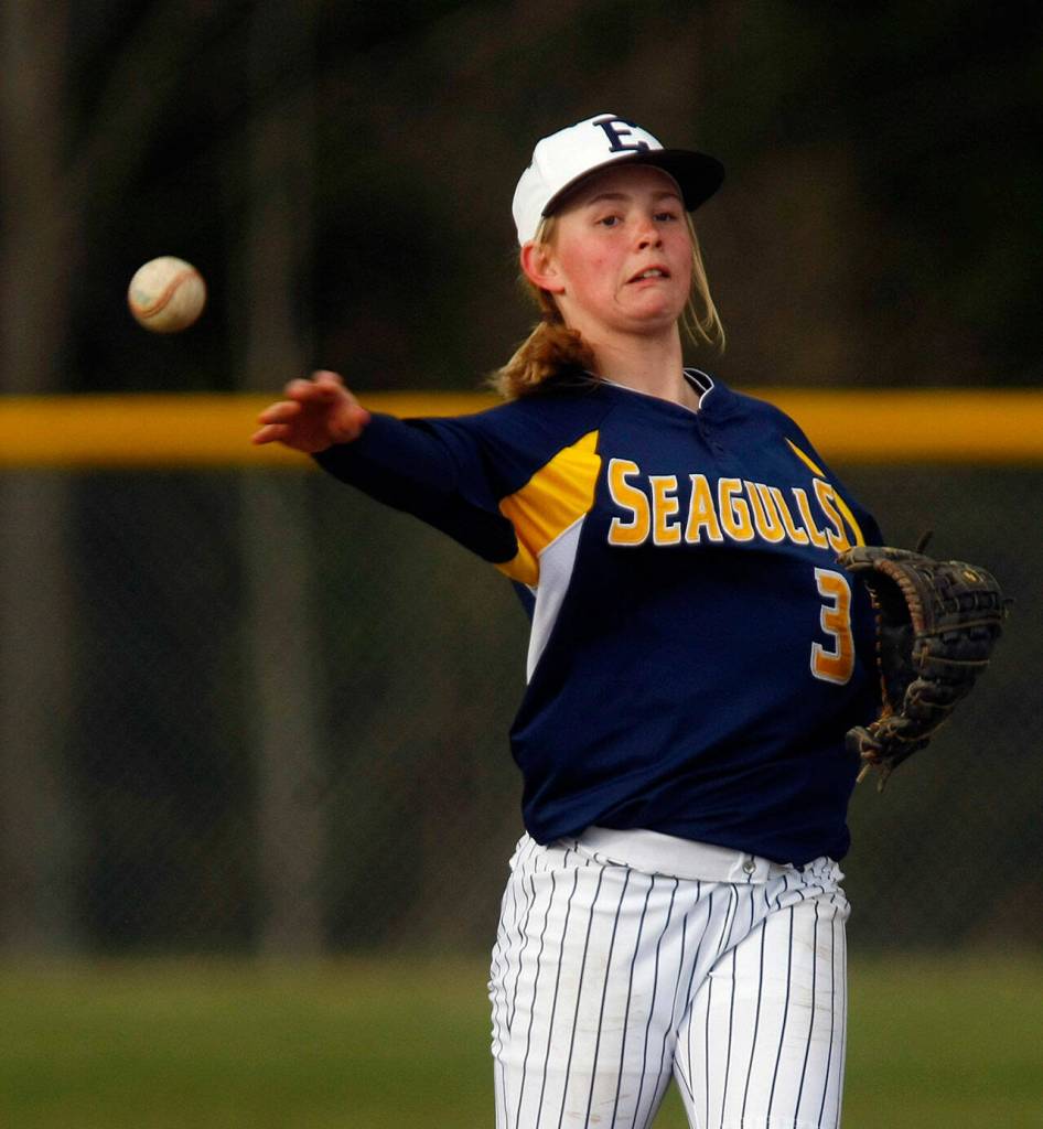 Megan Dedrick throws to first base during Everett's game against Glacier Peak on Wednesday, March 22, 2013. Dedrick, then 14 years old, was the second-base starter on Everett's boys baseball team that year. (Genna Martin / The Herald)