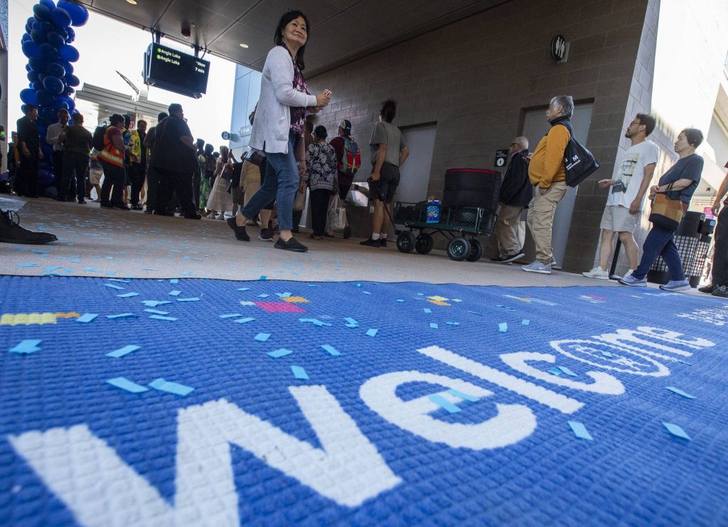 Members of the public line up to ride the first trains during the Lynnwood 1 Line extension opening celebrations on Friday, Aug. 30, 2024 in Lynnwood, Washington. (Olivia Vanni / The Herald)