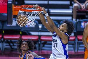 Sacramento Kings forward Isaac Jones (17), a former Washington State Cougar, dunks the ball as Phoenix Suns forward Jalen Bridges (15) looks up during the first half of an NBA Summer League game at the Thomas & Mack Center on Saturday, July 20, 2024, in Las Vegas. (L.E. Baskow/Las Vegas Review-Journal / Tribune News Services)
