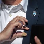 A person wears a Link light rail train pin on Wednesday, Aug. 28, 2024 in Lynnwood, Washington. (Olivia Vanni / The Herald)