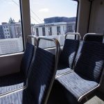 Terrace Station apartments are visible outside of the Link light rail as it moves southbound on Wednesday, Aug. 28, 2024 in Mountlake Terrace, Washington. (Olivia Vanni / The Herald)