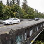 Cars move across the Edgewater Bridge toward Everett last year. (Olivia Vanni / The Herald)