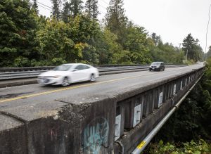 Cars move across the Edgewater Bridge toward Everett last year. (Olivia Vanni / The Herald)