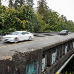 Cars move across the Edgewater Bridge toward Everett last year. (Olivia Vanni / The Herald)