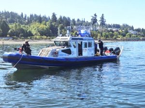 Everett police's Marine Operations Unit Dive Team continue to search for a kayaker on Wednesday, missing since Aug. 18. (Everett Police Department)