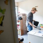 Jack White sets up his desk at Hazelwood Elementary on Monday, Aug. 26, 2024 in Lynnwood, Washington. (Olivia Vanni / The Herald)