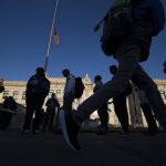 Students walk around to find their schedules and get checked in during the first day of school at Everett High on Monday, April 19, 2021 in Everett, Washington. (Andy Bronson / The Herald)
