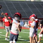 Sophomore quarterback Alex Maldonado throws the football during the Stanwood High School football practice at Bob Larson Stadium in Stanwood, Washington on Aug. 30, 2024. (Taras McCurdie / The Herald)