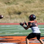 Senior wide receiver and safety Aaron Clifton prepares to catch the football during a drill at the Monroe High School football practice in Monroe, Washington on Aug. 29, 2024. (Taras McCurdie / The Herald)