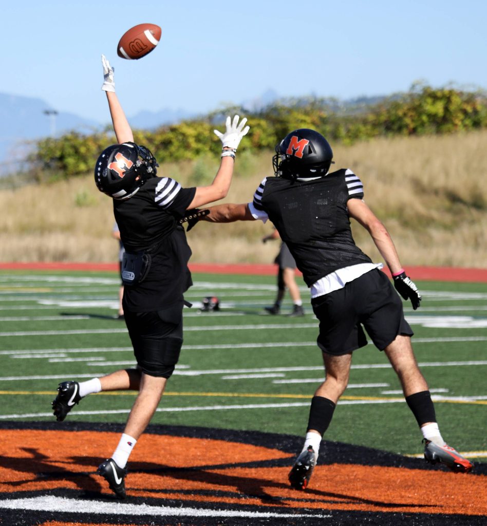 A scene from the Monroe High School football practice in Monroe on Aug. 29. (Taras McCurdie / The Herald)