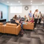 People chat at a gathering for Helping Hands newly expanded outpatient behavioral health facility on Friday, Sept. 6, 2024 in Everett, Washington. (Olivia Vanni / The Herald)