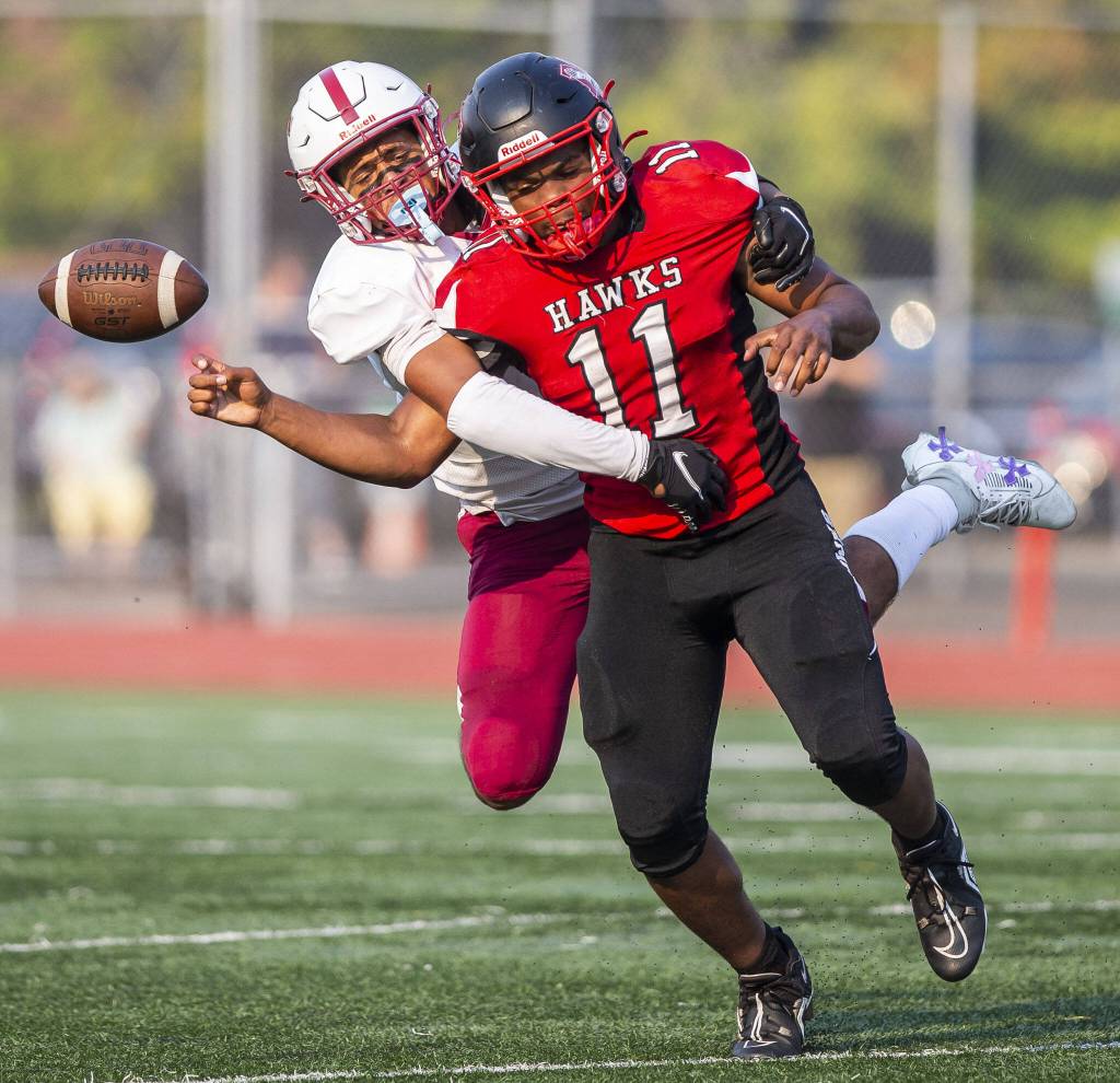 Cascades Marcell Alexander strips the ball from Mountlake Terraces Mason Wilson during the game on Friday, Sept. 6, 2024 in Edmonds, Washington. (Olivia Vanni / The Herald)