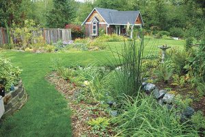 One example of a completed rain garden, established at a home in Monroe. The Adopt a Stream Foundation is hosting a free rain garden workshop Sept. 19. (Courtesy of Snohomish County)