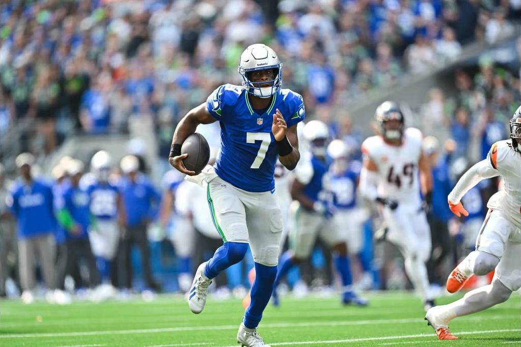Seahawks quarterback Geno Smith runs for the Seahawks first touchdown of the season against the Denver Broncos at Lumen Field on Sunday, Sept. 8 2024. (Photo courtesy of the Seattle Seahawks)