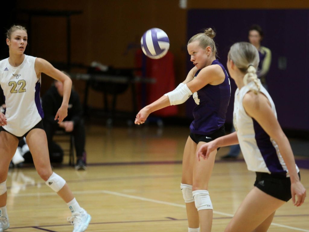 Lake Stevens freshman defensive specialist Audrey Iseminger returns a serve in the season opener against Curtis High School in Lake Stevens, Wash., on Sept. 11, 2024. Curtis won all three sets: 25-19, 25-20 and 25-18. (Taras McCurdie / The Herald)