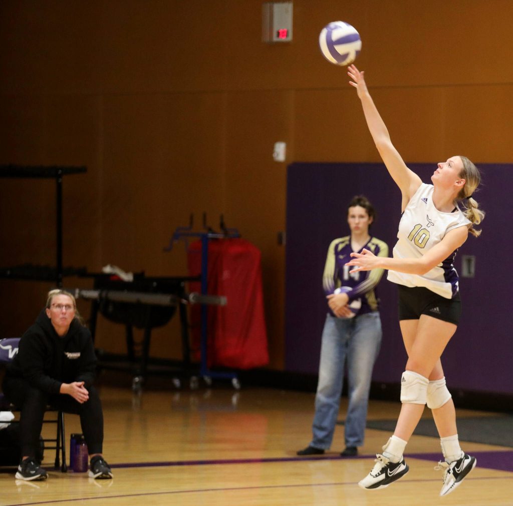 Lake Stevens senior outside hitter Jayci Scrivens serves the volleyball in the season opener against Curtis High School in Lake Stevens, Wash., on Sept. 11, 2024. Curtis won all three sets: 25-19, 25-20 and 25-18. (Taras McCurdie / The Herald)