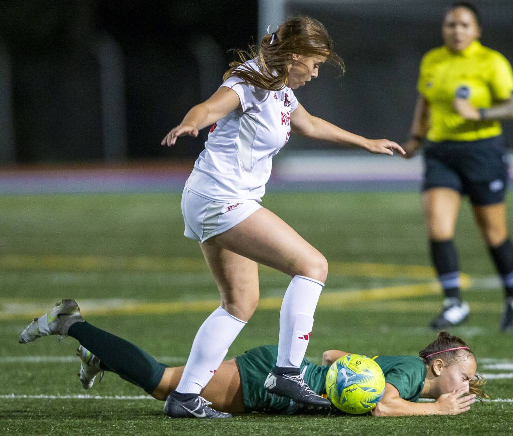 Archbishop Murphys Kamdyn Latta steals the ball away from Shorecrests Olivia Taylor during the game on Tuesday, Sept. 17, 2024 in Shoreline, Washington. (Olivia Vanni / The Herald)