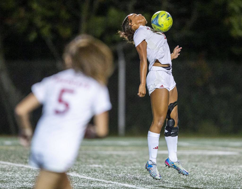 Archbishop Murphys Ari Sullivan leaps in the air to trap the ball during the game against Shorecrest on Tuesday, Sept. 17, 2024 in Shoreline, Washington. (Olivia Vanni / The Herald)