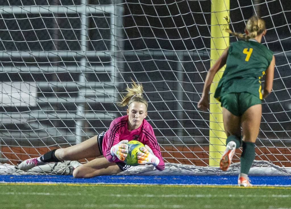 Archbishop Murphys Elle Kahn stops a shot on goal during the game against Shorecrest on Tuesday, Sept. 17, 2024 in Shoreline, Washington. (Olivia Vanni / The Herald)