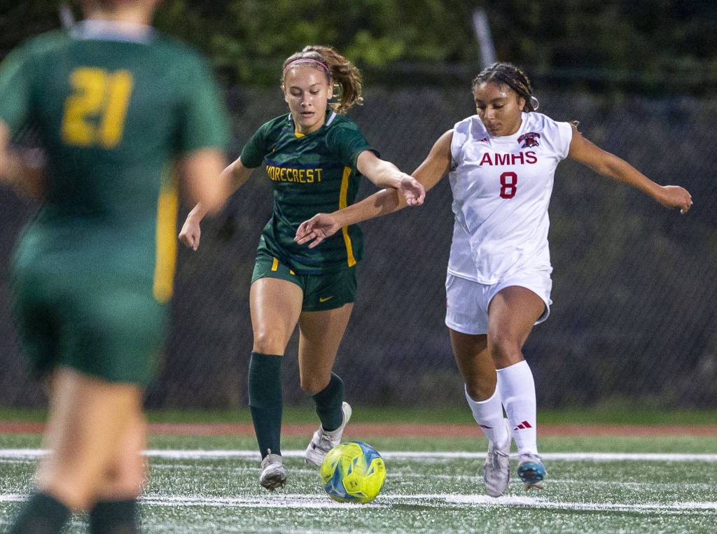 Shorecrests Olivia Taylor and Archbishop Murphys Kayla Hookfin run after the ball during the game on Tuesday, Sept. 17, 2024 in Shoreline, Washington. (Olivia Vanni / The Herald)