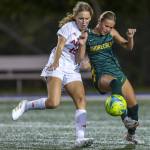 Archbishop Murphys Laura Anderson and Shorecrests Kai Johnson fight for the ball during the game on Tuesday, Sept. 17, 2024 in Shoreline, Washington. (Olivia Vanni / The Herald)