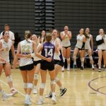 Lake Stevens volleyball players celebrate after scoring a point in their season opener against Curtis High School in Lake Stevens, Wash., on Sept. 11, 2024. Curtis won all three sets: 25-19, 25-20 and 25-18. (Taras McCurdie / The Herald)