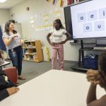 Students attend an English-language-learners class at Fulton Elementary School in Springfield, Ohio on Aug. 27. Businesses needed workers, and Haitians, many already authorized to work, heard living costs were low in Springfield. But the newcomers have strained resources, and that has fueled tension, now further complicated by false accusations against the Haitian community. (Maddie McGarvey / The New York Times)