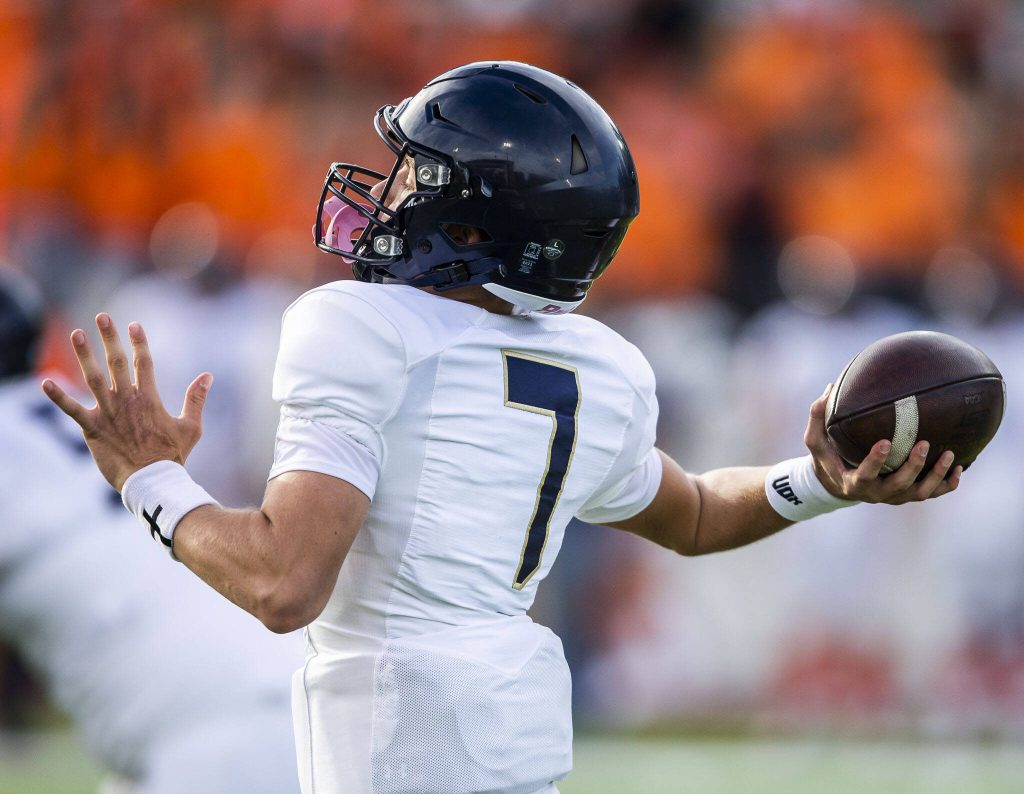 Arlingtons Leyton Martin throws the ball during the game against Jackson on Friday, Sept. 20, 2024 in Everett, Washington. (Olivia Vanni / The Herald)