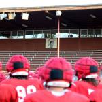 A team photo with the Stanwood High School Spartans logo in the background at Bob Larson Stadium in Stanwood on Aug. 30. (Taras McCurdie / The Herald)