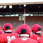 A team photo with the Stanwood High School Spartans logo in the background at Bob Larson Stadium in Stanwood on Aug. 30. (Taras McCurdie / The Herald)