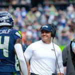 Seahawks head coach Mike Macdonald greets receiver DK Metcalf (14) during a game against the Miami Dolphins at Lumen Field on Sunday, Sept. 22, 2024. (Photo courtesy of Edwin Hooper / Seattle Seahawks)