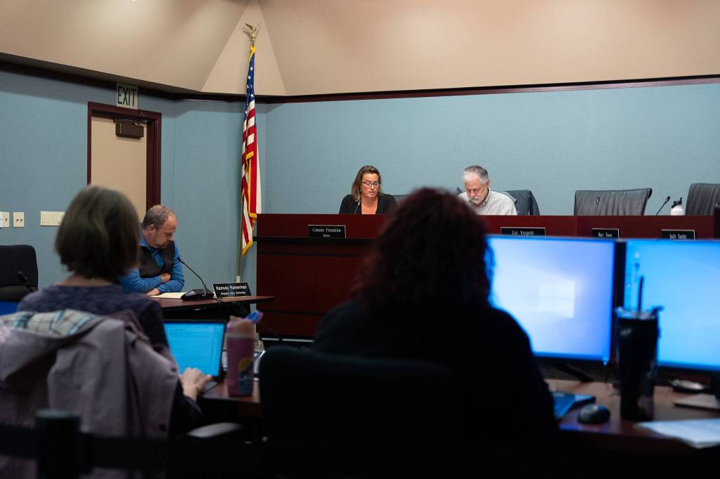 Everett Mayor Cassie Franklin, left, and City Council Vice President Ben Zarlingo at Wednesday's budget meeting in Everett, Washington. (Will Geschke / The Herald)