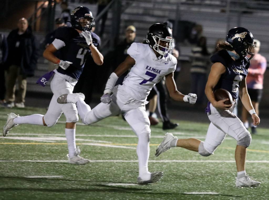 Arlington High School senior wide receiver Chase Deberry runs toward the end zone during the Wesco 4A game against Kamiak High School at John C. Larson Stadium, in Arlington, Washington, on Sept. 27, 2024. Arlington won 52-7. (Taras McCurdie / The Herald)