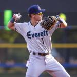 Everett AquaSox infielder Colt Emerson, the Seattle Mariners third-ranked prospect, throws a baseball to first base between innings during Everetts game against the Hillsboro Hops on August 8, 2024, at Hillsboro Ballpark in Hillsboro, Oregon. (Photo courtesy of Evan Morud / Everett AquaSox)