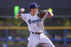 Everett AquaSox infielder Colt Emerson, the Seattle Mariners third-ranked prospect, throws a baseball to first base between innings during Everetts game against the Hillsboro Hops on August 8, 2024, at Hillsboro Ballpark in Hillsboro, Oregon. (Photo courtesy of Evan Morud / Everett AquaSox)