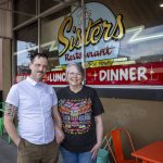 Jackson Quall, left, and Victoria Tory Quall, right, pose for a photo at the The Sisters Restaurant on June 21 in Everett. (Annie Barker / The Herald)