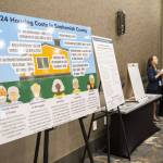 Info boards surrounds the outside of the conference room at Edge of Amazing on Tuesday, Oct. 1, 2024 in Everett, Washington. (Olivia Vanni / The Herald)