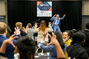 Director for the Snohomish County Health Department Dennis Worsham leads a short exercise during the Edge of Amazing event on Tuesday, Oct. 1, 2024 in Everett, Washington. (Olivia Vanni / The Herald)