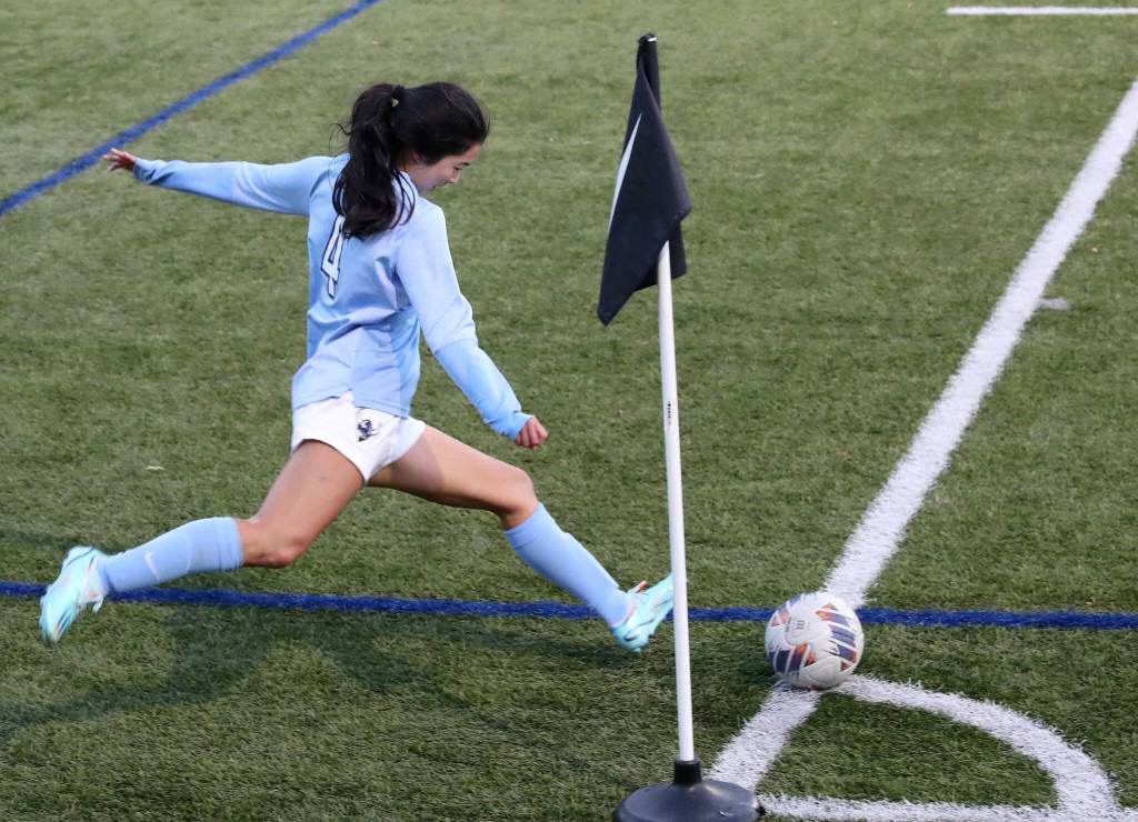 Western Washington Universitys Morgan Manalili, a Shorewood High School graduate, takes a corner kick during the Western-Point Loma game at Harrington Field in Bellingham, Wash., on Nov. 12, 2022. (Taras McCurdie / The Herald)