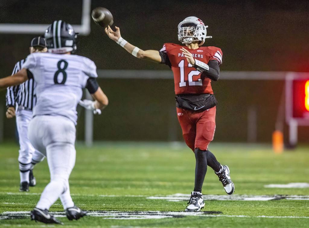 Snohomishs Evan Ruiz throws a pass during the game against Mount Vernon on Friday, Oct. 4, 2024 in Snohomish, Washington. (Olivia Vanni / The Herald)