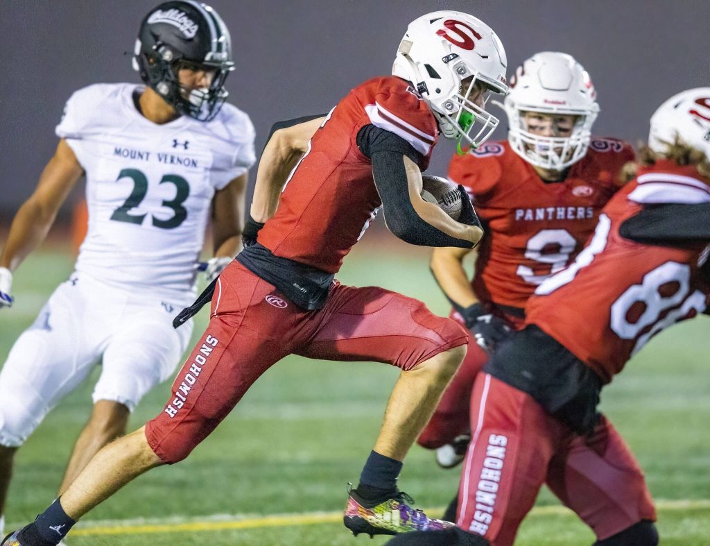 Snohomishs Parker Jackson runs the ball during the game against Mount Vernon on Friday, Oct. 4, 2024 in Snohomish, Washington. (Olivia Vanni / The Herald)