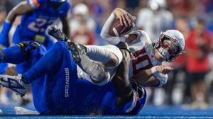 Boise State defensive tackle Braxton Fely sacks Washington State quarterback John Mateer at Albertsons Stadium on Sept. 28, 2024. (Darin Oswald / Tribune News Service)