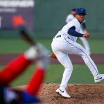 Aquasox pitcher Joseph Hernandez does a complete spin on his follow-through during a game against the Vancouver Giants on Wednesday, June 5, 2024, at Funko Field in Everett, Washington. (Ryan Berry / The Herald)