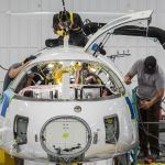 Workers build the all-electric commuter plane, the Eviation Alice, at Eviations plant in 2021 in Arlington. (Andy Bronson / The Herald)
