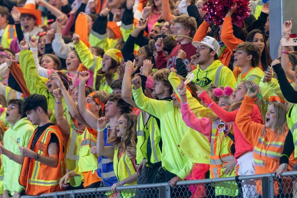 Lake Stevens High School students cheer on their football team during a game against Glacier Peak in Lake Stevens, Wash., on Friday, Oct. 4, 2024. (John Gardner / Pro Action Image)
