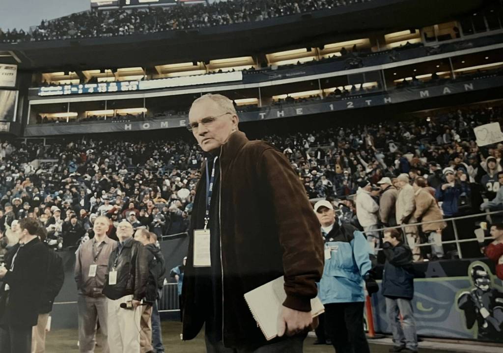 Former Herald columnist Larry Henry covers a game at Seahawks Stadium. (Photo courtesy of Rae Henry)