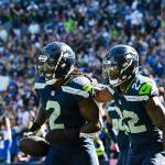 Seahawks safety Rayshawn Jenkins (2) celebrates with teammate Tre Brown (22) after returning a fumble 102 yards for a touchdown against the New York Giants on Oct. 6, 2024 at Lumen Field in Seattle. (Photo courtesy of the Seattle Seahawks)